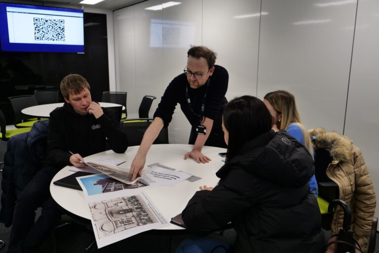 Rise staff and students in a workshop session