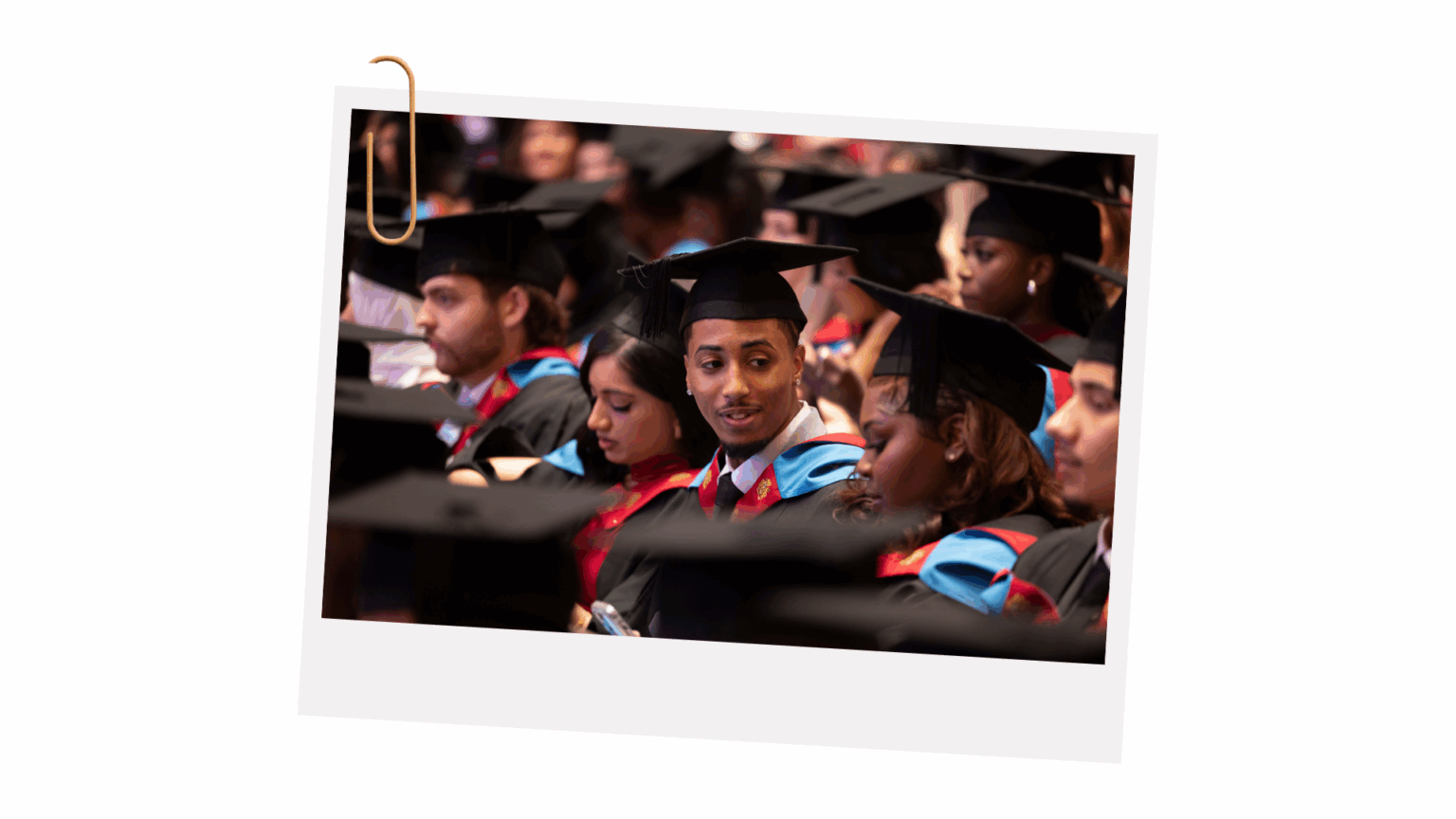Group of students sat at their graduation